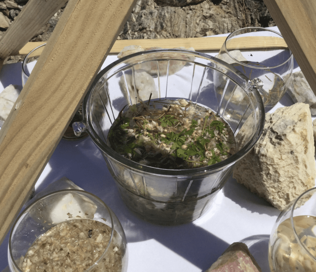 A bowl of food on top of a table.